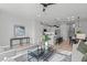Open-concept living area flowing seamlessly into the kitchen and dining spaces with natural light at 610 Rocky Knob Ct, Raleigh, NC 27601