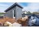 Relax on this expansive rooftop deck with stylish outdoor furniture and privacy fencing at 610 Rocky Knob Ct, Raleigh, NC 27601