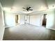 Large bedroom with access to walk-in closets and a bathroom at 156 Southern Estates Dr, Sanford, NC 27330