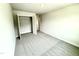Bright bedroom with plush carpeting and a closet at 156 Southern Estates Dr, Sanford, NC 27330