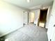 Spacious bedroom featuring neutral walls and plush carpeting at 156 Southern Estates Dr, Sanford, NC 27330
