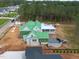 Overhead view of a home under construction, displaying roof, layout, and nearby properties at 4812 Parker Meadow Dr, Raleigh, NC 27614