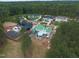 An aerial view showcasing new construction in a community featuring many stately homes with pristine landscaping at 4812 Parker Meadow Dr, Raleigh, NC 27614