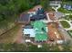 Newly constructed home in an upscale community featuring a black roofed modern home next door at 4812 Parker Meadow Dr, Raleigh, NC 27614
