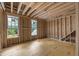 Bedroom under construction featuring wood framing, natural light and a view of the outdoors at 4812 Parker Meadow Dr, Raleigh, NC 27614