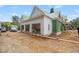 Newly built home with an attached garage and white siding, showcasing modern construction at 4812 Parker Meadow Dr, Raleigh, NC 27614