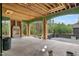 Unfinished great room featuring a stone fireplace, with views of the outdoors at 4812 Parker Meadow Dr, Raleigh, NC 27614