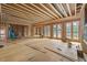 Unfinished living room space featuring wood framing and ample natural light from multiple windows at 4812 Parker Meadow Dr, Raleigh, NC 27614