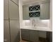 Chic bar area with custom cabinets, wine rack, and elegant lighting at 5208 Knollwood Rd, Raleigh, NC 27609