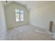 Cozy bedroom with natural light, awaiting your personal design to create a comfortable retreat at 5208 Knollwood Rd, Raleigh, NC 27609