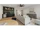 Open-concept living space with a stylish bar area, comfortable seating, and natural light at 5208 Knollwood Rd, Raleigh, NC 27609