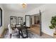 Cozy home office with a modern desk, stylish chair, built-in shelving, and ample natural light at 5208 Knollwood Rd, Raleigh, NC 27609