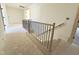 Staircase with modern railings at 5208 Knollwood Rd, Raleigh, NC 27609