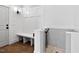 Functional mudroom with a dog wash station, bench seating, and modern fixtures at 55 Harvest View Way, Franklinton, NC 27525