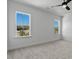 Bedroom with large windows providing ample natural light at 55 Harvest View Way, Franklinton, NC 27525