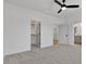 Bedroom with carpet, ceiling fan, walk-in closet, and en suite bathroom at 55 Harvest View Way, Franklinton, NC 27525