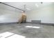 Spacious garage with staircase leading to the home at 55 Harvest View Way, Franklinton, NC 27525