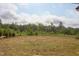 Spacious lot offers privacy and natural beauty with mature trees and open space at 55 Harvest View Way, Franklinton, NC 27525