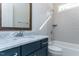 Modern bathroom with marble vanity and subway tile at 6052 Scalybark, Durham, NC 27712