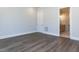 Bedroom features a window with a view of the neighborhood at 6052 Scalybark Rd, Durham, NC 27712