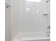 Stylish bathroom featuring marble countertops and a tiled shower/tub at 6052 Scalybark Rd, Durham, NC 27712