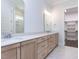 Bathroom with double vanity, quartz countertops, and lots of storage space at 6052 Scalybark Rd, Durham, NC 27712