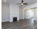 Cozy living room featuring a fireplace and open concept floor plan at 6052 Scalybark Rd, Durham, NC 27712