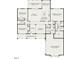 Light-filled bedroom features two windows and neutral carpeting at 6052 Scalybark Rd, Durham, NC 27712