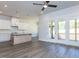 Spacious kitchen island with a sink and stainless steel dishwasher at 6052 Scalybark Rd, Durham, NC 27712
