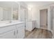 Elegant bathroom with double vanity, tile flooring, and a glass-enclosed shower at 117 Shelby Meadow Ln, Angier, NC 27501