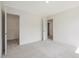 Bright bedroom with neutral carpet, walk-in closet, and ample natural light at 117 Shelby Meadow Ln, Angier, NC 27501