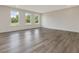 Spacious bedroom with three large windows that provide ample natural light at 117 Shelby Meadow Ln, Angier, NC 27501
