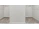 Spacious walk-in closet with carpet flooring and wire shelving for optimal organization at 117 Shelby Meadow Ln, Angier, NC 27501