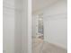 Hallway view to walk-in closet and bathroom with glass-door shower at 117 Shelby Meadow Ln, Angier, NC 27501