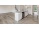 Kitchen island with stainless steel sink and dishwasher, offering additional counter space at 117 Shelby Meadow Ln, Angier, NC 27501