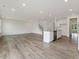 Open concept living area with kitchen island and plenty of natural light at 117 Shelby Meadow Ln, Angier, NC 27501