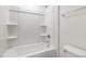 Bathroom features a shower/tub combo and built-in shelving at 117 Shelby Meadow Ln, Angier, NC 27501