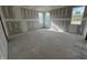 Well-lit bedroom featuring two windows at 6048 Scalybark Rd, Durham, NC 27712