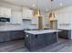 Open-concept living space with fireplace and sliding glass doors to the backyard at 6048 Scalybark Rd, Durham, NC 27712