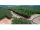 An aerial view of a road being built in a beautiful, wooded area of a new neighborhood at 37 Green Turtle Ln, Pittsboro, NC 27312