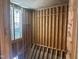 Interior unfinished room with exposed framing and window at 37 Green Turtle Ln, Pittsboro, NC 27312