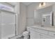 Contemporary bathroom with a glass-enclosed shower and modern vanity at 9140 Dupree Meadow Dr # 9, Angier, NC 27501