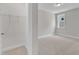 Neutral bedroom with carpet flooring, a window, and a walk-in closet at 9140 Dupree Meadow Dr # 9, Angier, NC 27501
