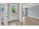 Bright entryway featuring wood flooring, white trim, and natural light at 9140 Dupree Meadow Dr # 9, Angier, NC 27501