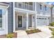 Inviting entryway of home with craftsman details and address displayed above door at 9140 Dupree Meadow Dr # 9, Angier, NC 27501