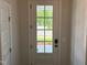 Entryway featuring a glass paneled door with a view of the front yard and sidewalk outside at 9140 Dupree Meadow Dr # 9, Angier, NC 27501