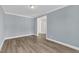 Spacious living room with modern flooring, neutral walls, and bright white trim provides a clean and welcoming space at 9140 Dupree Meadow Dr # 9, Angier, NC 27501