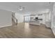 Spacious living room provides open access to the modern kitchen and staircase at 9140 Dupree Meadow Dr # 9, Angier, NC 27501