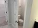 This powder room features a toilet and a tile floor at 9140 Dupree Meadow Dr # 9, Angier, NC 27501