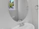 Stylish powder room featuring a modern vanity and decorative mirror at 9140 Dupree Meadow Dr # 9, Angier, NC 27501